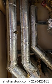 Insulated Water Pipes In The Ceiling Of A Commercial Building