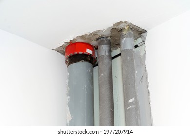 Insulation Of Water Pipes With Polyethylene Foam. A Polypropylene Sewer Pipe Installed In The Apartment. Close-up. Copy Space