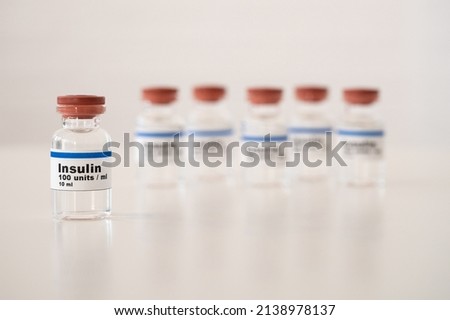 Insulin vials against a white background: properly cooling and storing insulin. 