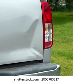 An Insurance Agent And An Auto Body Repair Person May Be Called After This Minor Fender Bender. The Damage To The Tailgate Is Minimal. Bokeh Effect.