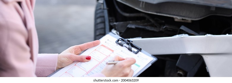 An Insurance Agent Describes Damage To Motor Vehicle