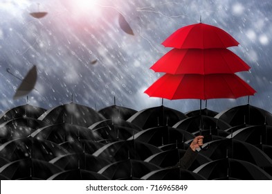 Insurance agent holding red umbrella three layers to protect the life, health, savings, investment and accident, Insurance concept.