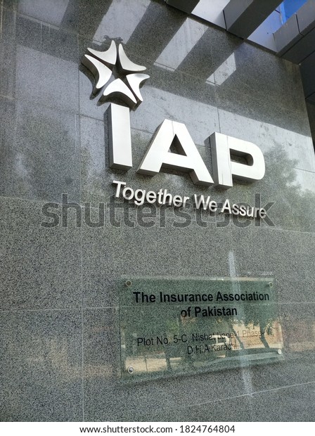 The\
insurance association of Pakistan (IAP) logo on a black tile wall\
outside their office  - Karachi Pakistan - Sep\
2020