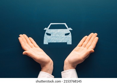 Insurance Car Icon And Care Concept. Female Tender Hands With A Car Symbol Drawing On Chalkboard.