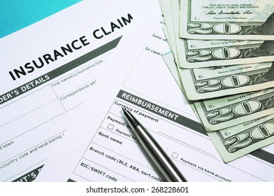 Insurance Claim Form With Money For Insurance Concept