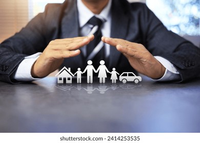 insurance concept with businessman using two hand in protection gesture to family life and property like a car and house represent to ensure and worry free in any activity - Powered by Shutterstock