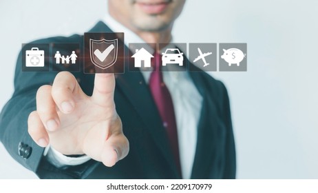 Insurance Concept With Options On The Virtual Screen,  Businessman Choose Options Insurance Icons, Car, Travel, Family And Life, Financial And Health Insurance Savings