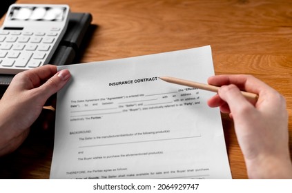 Insurance Contract Concept. Paper Document, Agreement In Hands POV.