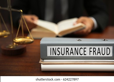 Insurance Fraud Concept. Folder And Man On Background
