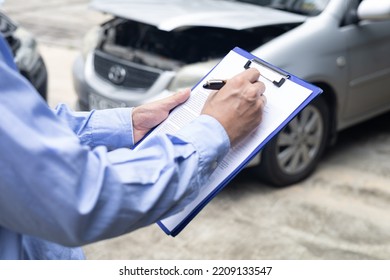 Insurance Officer Agent Working During On Site Car Accident Claim Process