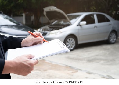 Insurance Officer Agent Working During On Site Car Accident Claim Process