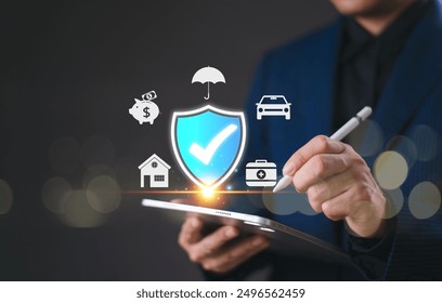 Insurance online agent solution concept, life, family, health, and financial technology. Businessman use tablet giving insurance and assurance icon, real estate, car and finance for risk management. - Powered by Shutterstock