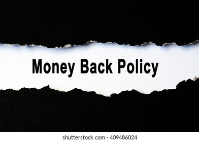 Insurance Policy Concept - Money Back Policy Under Torn Paper