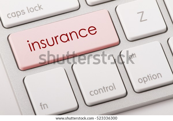 Insurance word
written on computer keyboard.  
