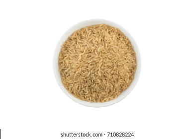 Integral Wholegrain Rice Into A Bowl Isolated On White Background