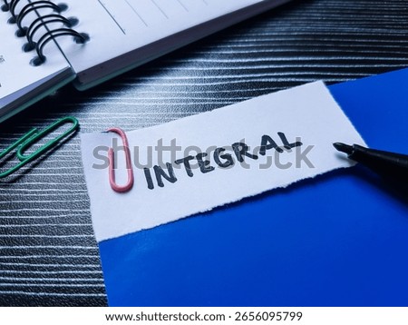 Integral writting on table background.