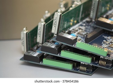 Integrated Circuits piled on a table.
