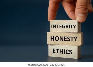 integrity honesty ethics, Ethics and honesty in life and business, hand arranging wooden blocks with the text " Integrity Honesty copy space, beautiful navy blue background