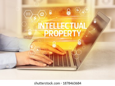 INTELLECTUAL PROPERTY Inscription On Laptop, Internet Security And Data Protection Concept, Blockchain And Cybersecurity