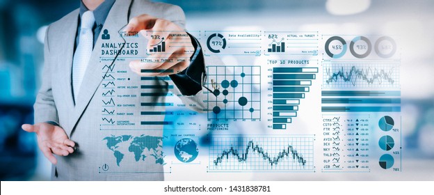 Intelligence (BI) and business analytics (BA) with key performance indicators (KPI) dashboard concept.business documents on office table with smart phone and digital tablet and graph on wide screen.