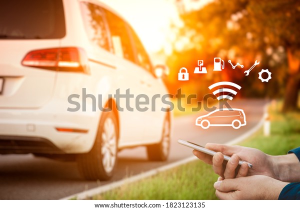 Intelligent car send wireless data\
on-line about car. Intelligent vehicle and smart cars\
concept.