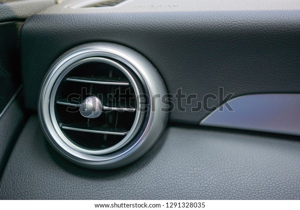 Intelligent car ventilation system Closeup and\
air conditioning system For the driver\'s comfort - details and\
modern car controls