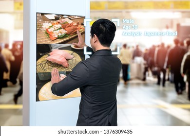 Intelligent Digital Signage , Augmented Reality Marketing And Face Recognition Concept. Interactive Artificial Intelligence Digital Advertisement Sushi Japanese Restaurant In Subway Or Sky Train.