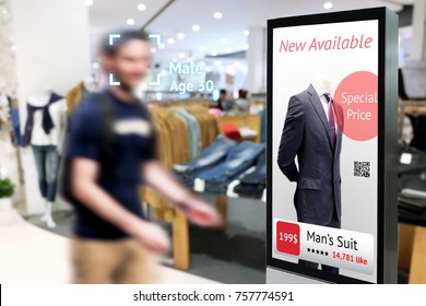 Intelligent Digital Signage , Augmented reality marketing and face recognition concept. Interactive artificial intelligence digital advertisement in fashion retail shopping Mall.