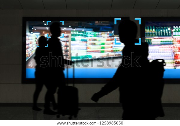Intelligent Digital Signage ,\
Augmented reality marketing and face recognition concept.\
Interactive artificial intelligence digital advertisement in retail\
shopping Mall.