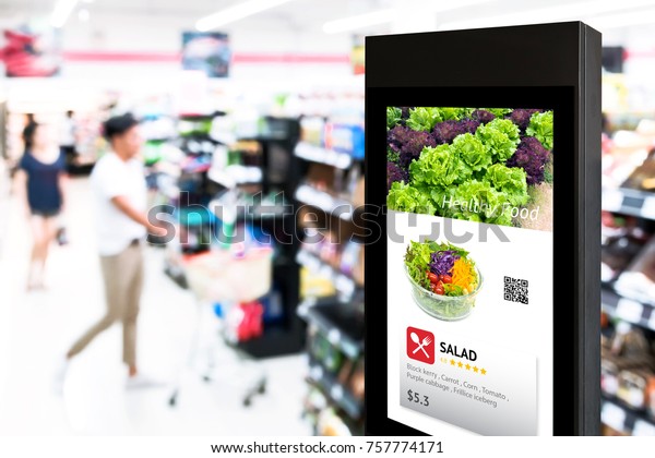 Intelligent Digital Signage ,\
Augmented reality marketing and face recognition concept.\
Interactive artificial intelligence digital advertisement in retail\
hypermarket Mall.