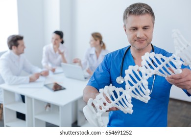 Intelligent medic observing genetic code model at the hospital