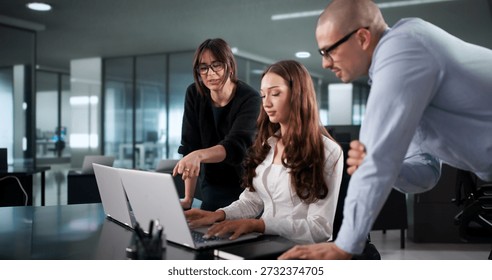 Intense Coding Session: Diverse Team Of Programmers Develop Software Programs. Cipher Fraud: Accountant