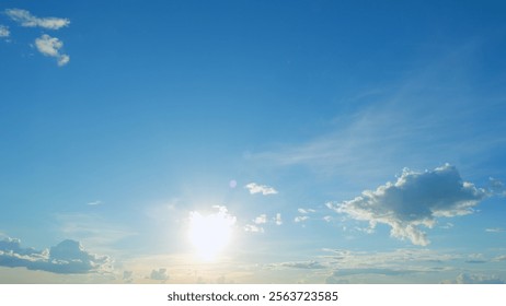 Intense dramatic panoramic sunset. Abstract different shades clouds at sunset sky background. Timelapse.
