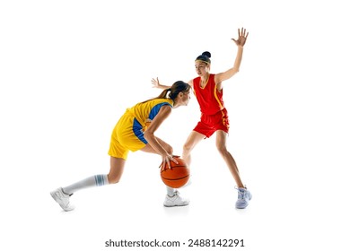 Intense game between basketball two young women, basketball players in colorful uniforms. playing isolated on white studio background. Concept of sport, active lifestyle, competition, game, dynamics - Powered by Shutterstock