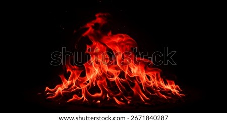 Intense Red Flames Dancing Against a Dark Backdrop, Creating a F