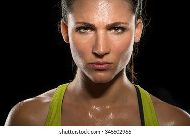 Intense Stare Eyes Determined Athlete Champion Glare Head Shot Sweaty Confident Woman Female Powerful Fighter Close Up