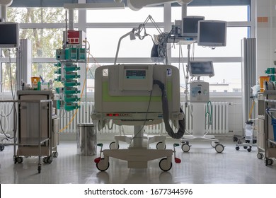 Intensive Care Unit In Hospital, Bed With Monitors, Ventilator, A Place Where Can Be  Treated Patients With Pneumonia Caused By Coronavirus Covid 19.