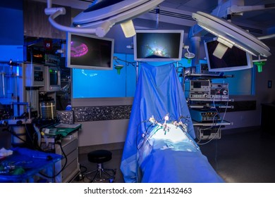 Intensive Care Unit In Hospital Medical Operating Theatre Room With Equipment And Video Camera Technology Supporting Laparoscopy Keyhole Surgery 