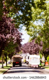 Intentional Blur Of Road Work Crew Milling The Pavement; Dump Truck, Asphalt Milling Machine And Street Sweeper Prepare The Road For Repavement