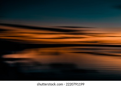 Intentional Camera Movement In A Beach Sunset. Horizontal Sweep Effect. Abstract Landscape. Long Exposure Photography.