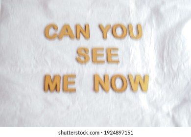 Intentional Camera Movement On The Question CAN YOU SEE ME NOW Written In 3d Wooden Alphabet Letters On White Fabric Background. Conceptual Image Of Vertigo, Migraine Headache, Diplopia Etc.