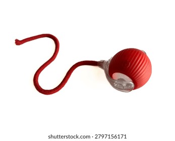 Interactive cat toy tower with rolling balls and a spring mouse, isolated on white background. Plastic roller track toy for kitten entertainment, pet shop product, and veterinary commercial mockup.