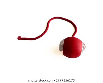 Interactive cat toy tower with rolling balls and a spring mouse, isolated on white background. Plastic roller track toy for kitten entertainment, pet shop product, and veterinary commercial mockup.