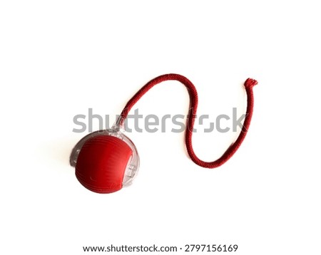 Interactive cat toy tower with rolling balls and a spring mouse, isolated on white background. Plastic roller track toy for kitten entertainment, pet shop product, and veterinary commercial mockup.