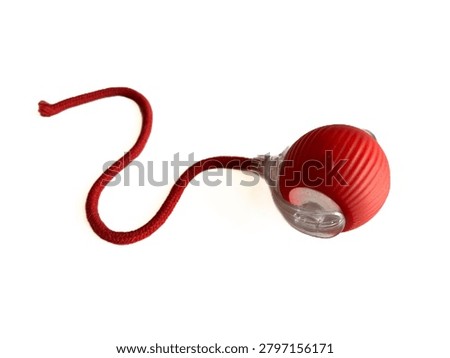 Interactive cat toy tower with rolling balls and a spring mouse, isolated on white background. Plastic roller track toy for kitten entertainment, pet shop product, and veterinary commercial mockup.