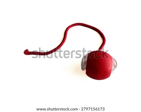 Interactive cat toy tower with rolling balls and a spring mouse, isolated on white background. Plastic roller track toy for kitten entertainment, pet shop product, and veterinary commercial mockup.