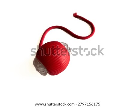 Interactive cat toy tower with rolling balls and a spring mouse, isolated on white background. Plastic roller track toy for kitten entertainment, pet shop product, and veterinary commercial mockup.