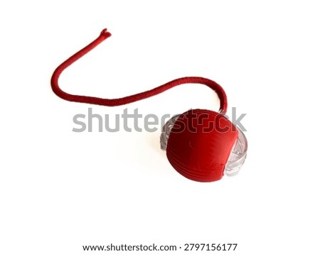 Interactive cat toy tower with rolling balls and a spring mouse, isolated on white background. Plastic roller track toy for kitten entertainment, pet shop product, and veterinary commercial mockup.
