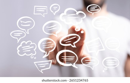 Interactive Communication: Man Touching Digital Speech Bubbles