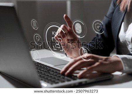 Interactive KYC compliance interface with the user. Business professional interacting with a Know Your Customer (KYC) compliance and security interface on digital screen. Identity verification, E KYC	
